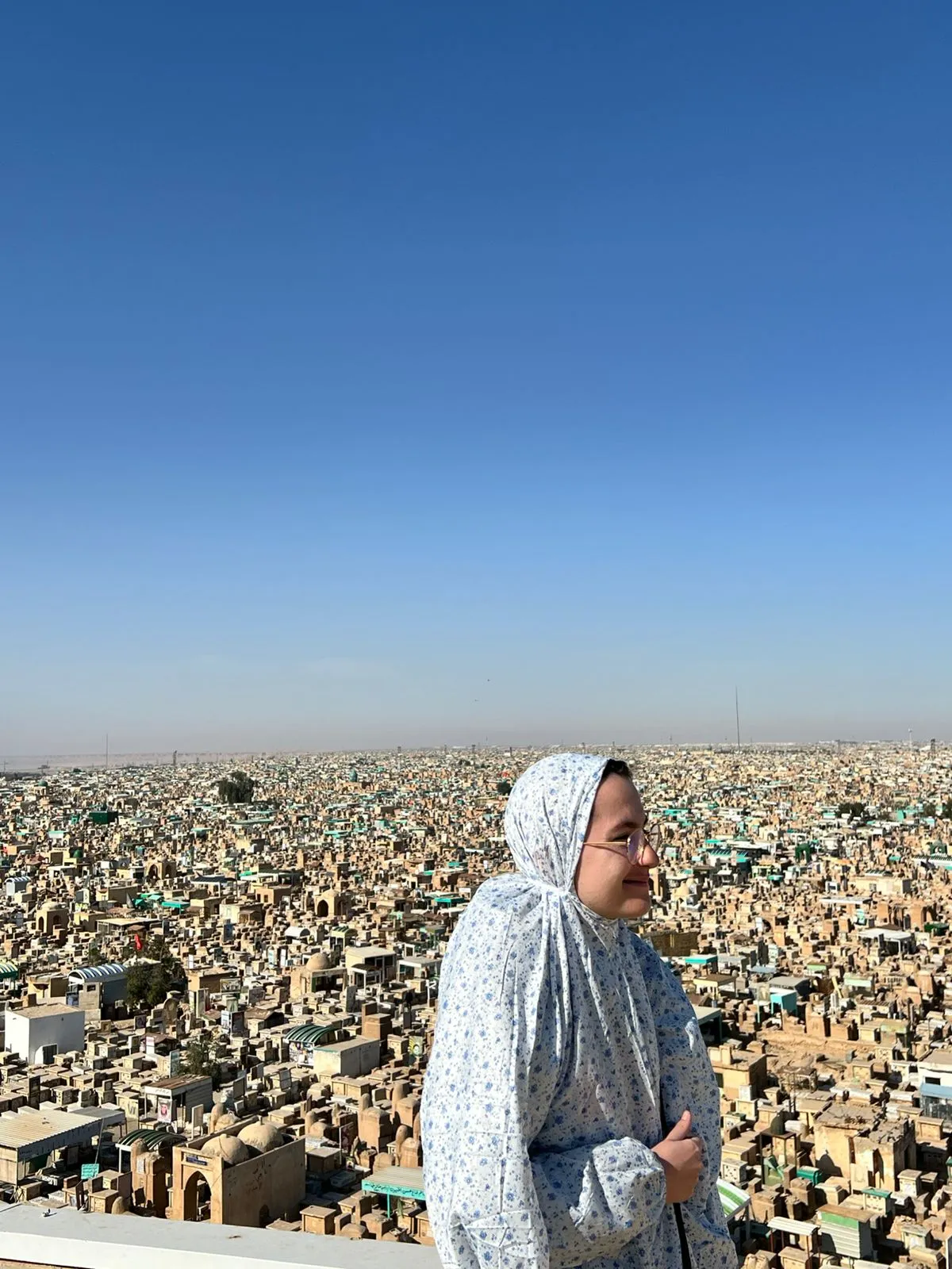 Wadi al-Salam in Najaf seen from above, the world's largest cemetery spreading in pale domes and vaults to the horizon.